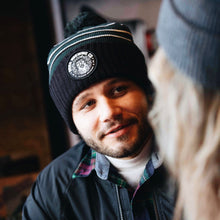 Load image into Gallery viewer, Bear the Crown, Black &amp; Green Beanie w/ Pom

